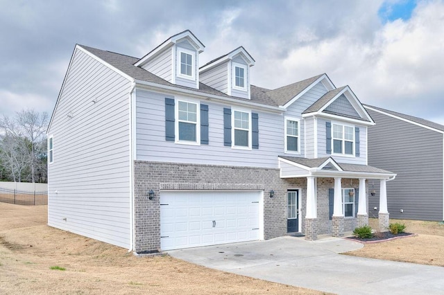 view of front of property with a garage