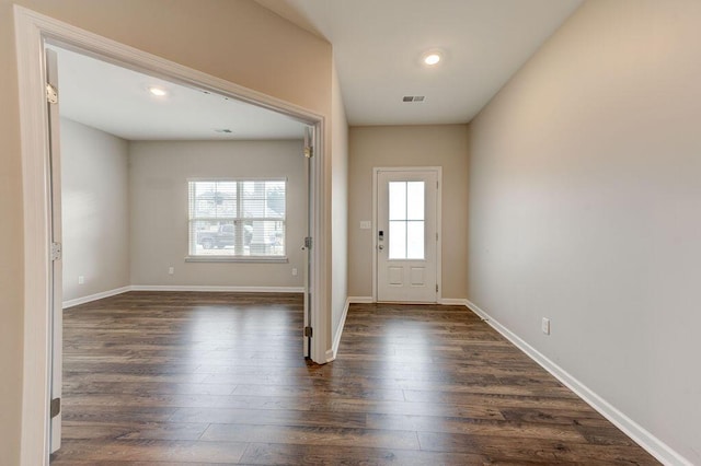 foyer entrance with dark wood-type flooring