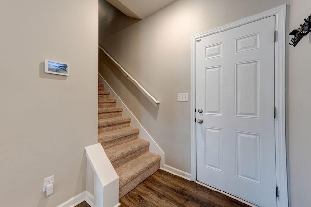 interior space with dark hardwood / wood-style flooring