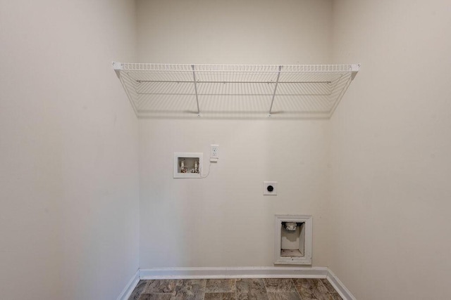 laundry room with hookup for a washing machine, hardwood / wood-style floors, and hookup for an electric dryer