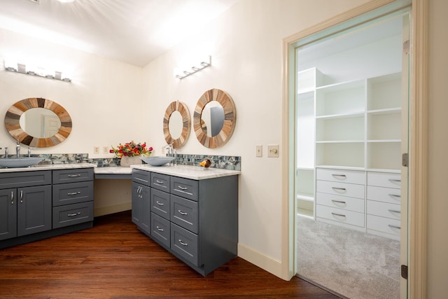 bathroom featuring hardwood / wood-style floors and vanity