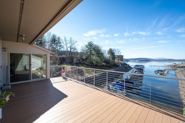 deck featuring a water view