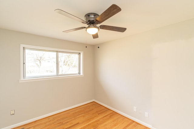 empty room featuring light hardwood / wood-style flooring and ceiling fan