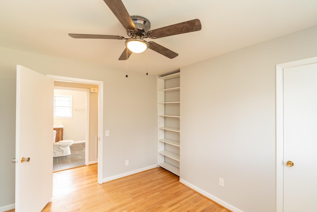 unfurnished bedroom featuring ceiling fan and light hardwood / wood-style floors