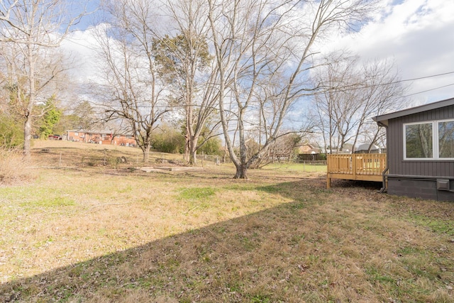 view of yard featuring a deck