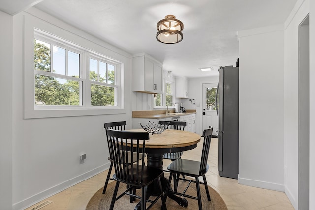 dining area featuring sink