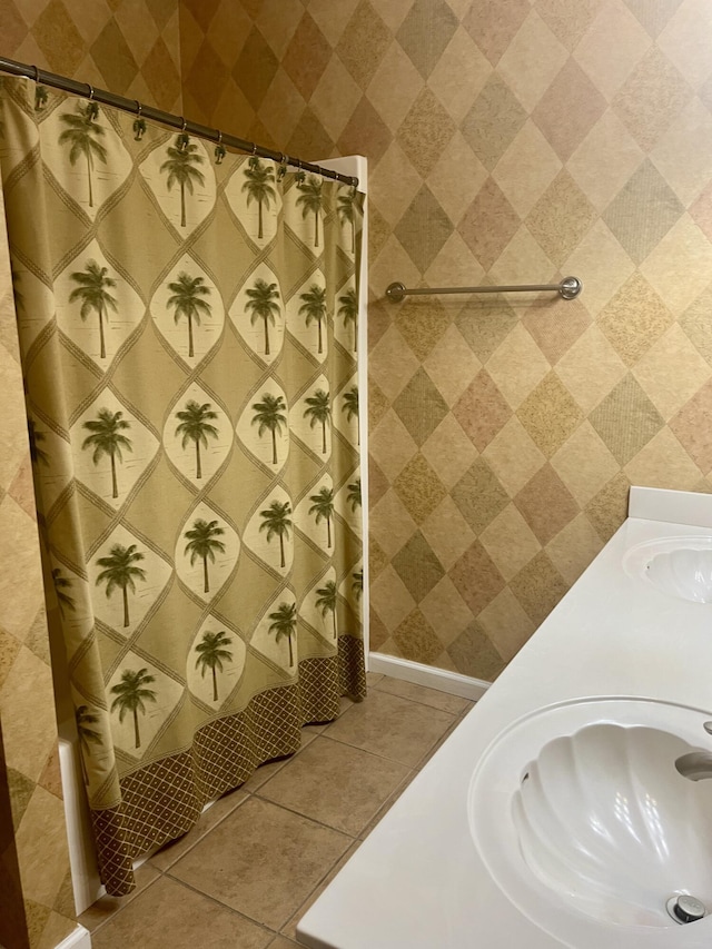 bathroom featuring tile patterned floors, a shower with curtain, and vanity