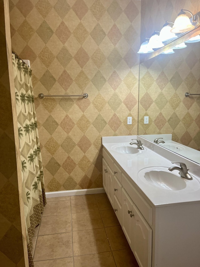 bathroom featuring tile patterned flooring and vanity