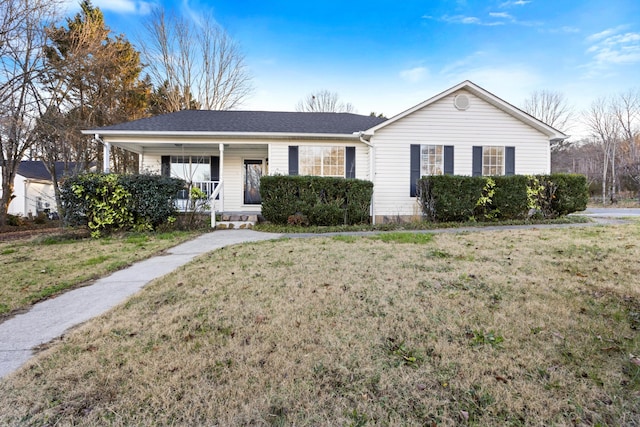 single story home with covered porch and a front lawn