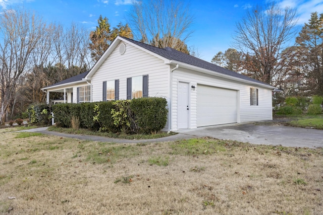 view of side of property with a garage