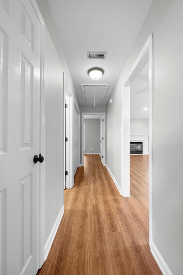 hallway featuring light hardwood / wood-style floors