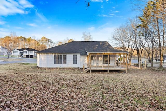 rear view of house with a deck