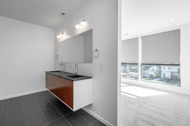 bathroom featuring sink and tile patterned floors