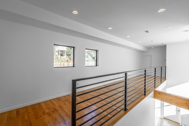 corridor featuring hardwood / wood-style flooring