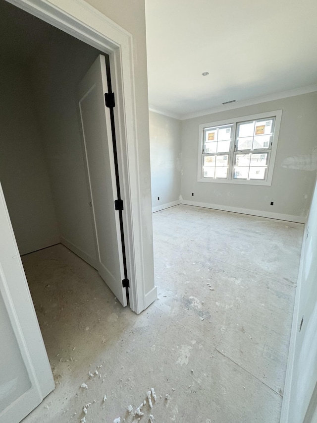 interior space with crown molding