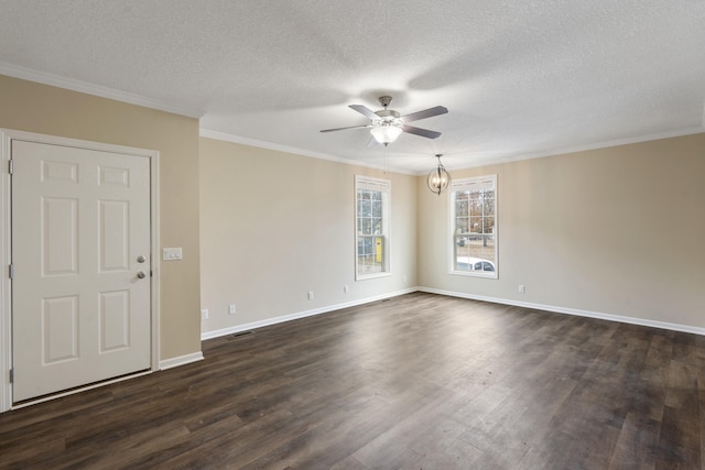 unfurnished room featuring ceiling fan with notable chandelier, ornamental molding, a textured ceiling, and dark wood-type flooring