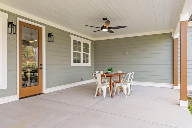 view of patio / terrace with ceiling fan and a porch