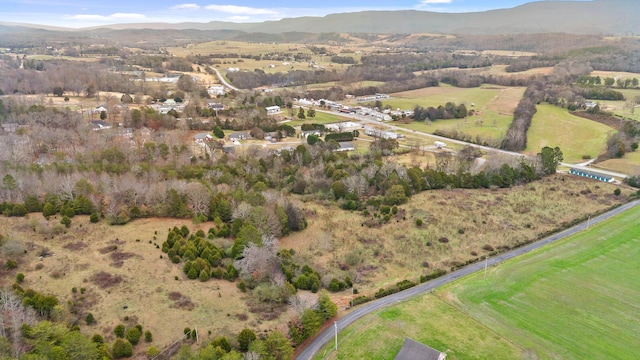 aerial view featuring a rural view and a mountain view