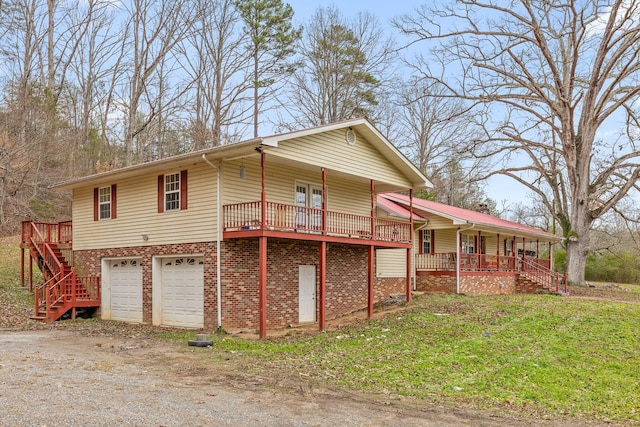 view of property exterior with a garage and a yard