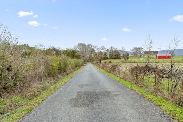 view of road featuring a rural view