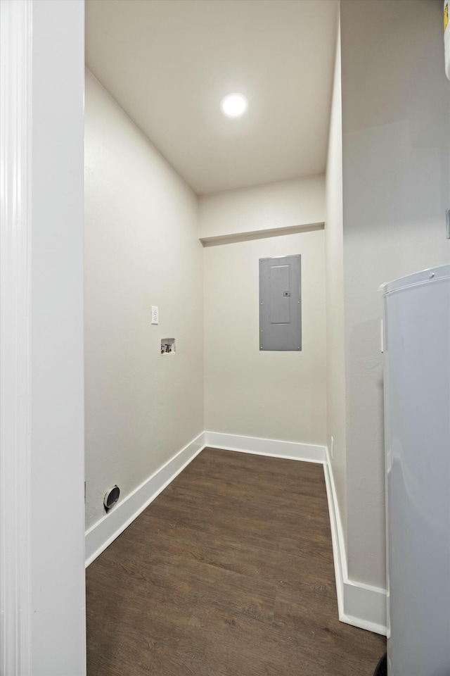 washroom featuring dark wood-type flooring and electric panel