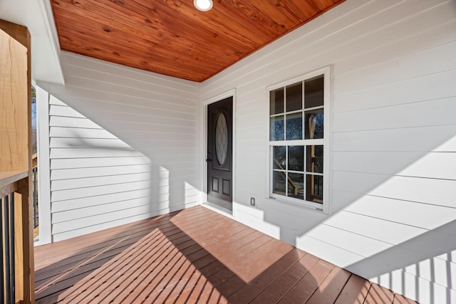 wooden terrace featuring a porch