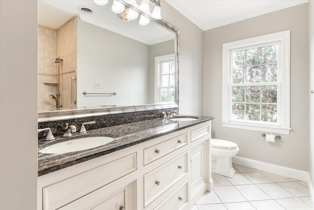 bathroom featuring tile patterned floors, ornamental molding, vanity, tiled shower, and toilet