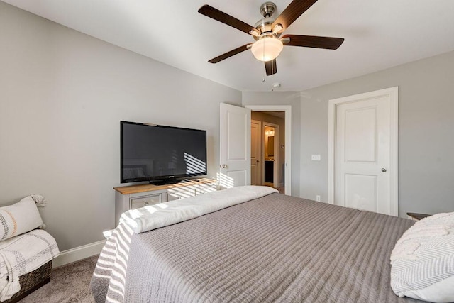 bedroom featuring light carpet and ceiling fan