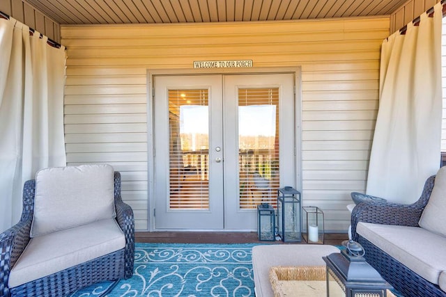 property entrance featuring french doors