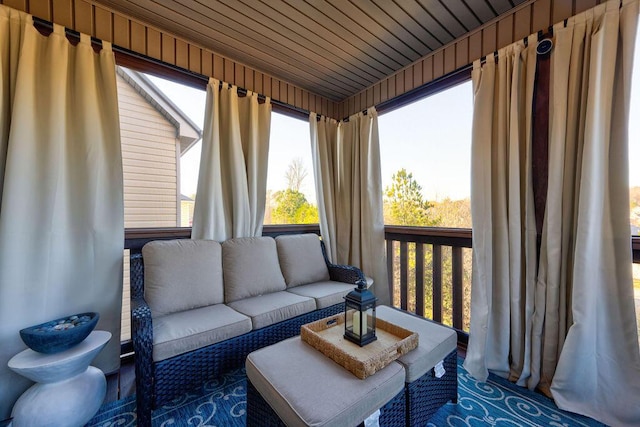 sunroom / solarium featuring wooden ceiling