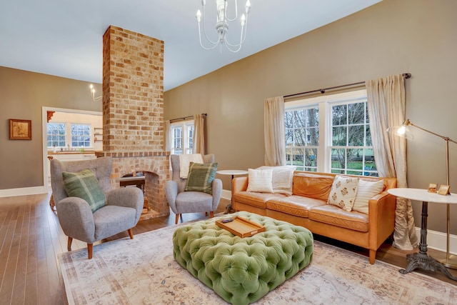 living room featuring hardwood / wood-style flooring and a notable chandelier