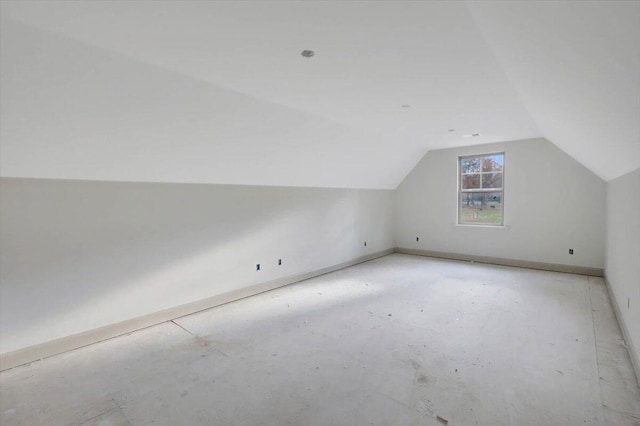 bonus room featuring lofted ceiling