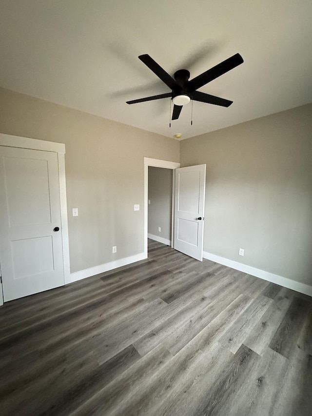 unfurnished bedroom with wood-type flooring and ceiling fan