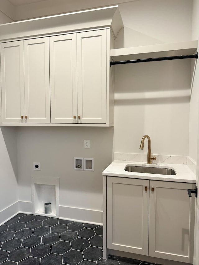 washroom with cabinets, hookup for a washing machine, electric dryer hookup, and sink