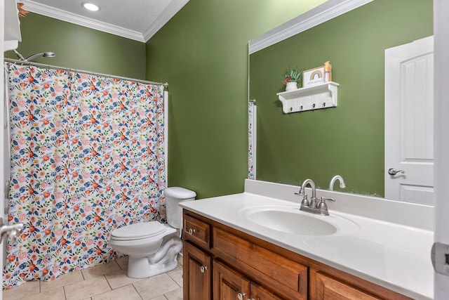 bathroom featuring tile patterned floors, vanity, toilet, and crown molding