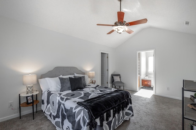 carpeted bedroom featuring ensuite bathroom, ceiling fan, and lofted ceiling