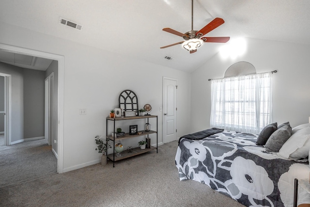 carpeted bedroom with ceiling fan and lofted ceiling