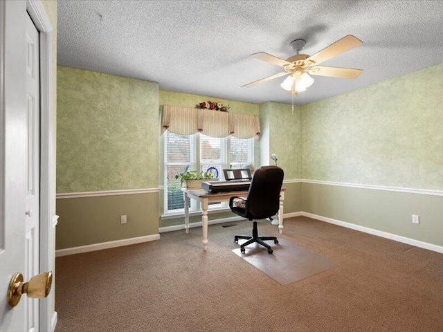 home office with ceiling fan and a textured ceiling