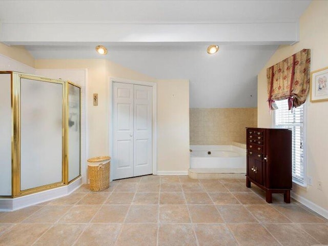 bathroom featuring lofted ceiling with beams and separate shower and tub