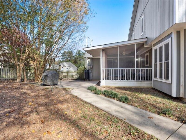 view of yard with a sunroom