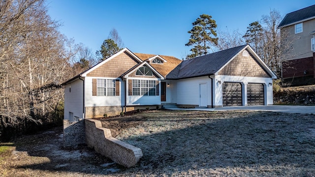 view of front of property with a garage