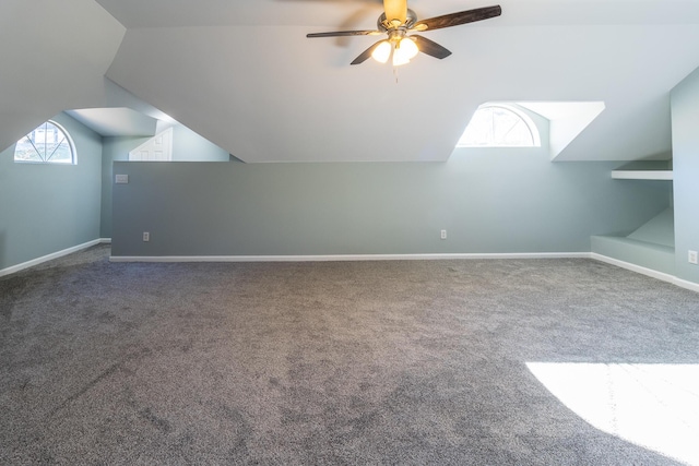 bonus room with ceiling fan, carpet, and vaulted ceiling