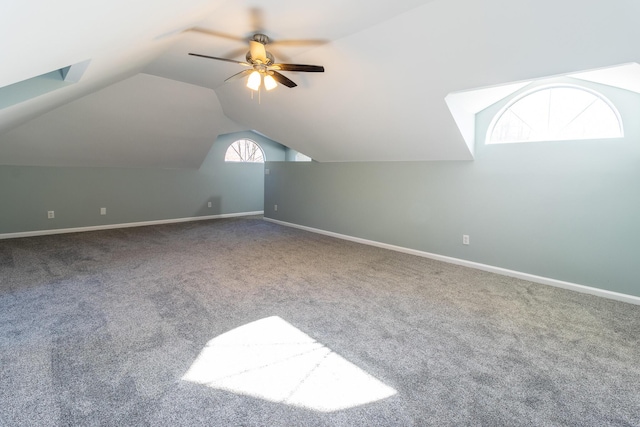 bonus room with carpet flooring, ceiling fan, and lofted ceiling