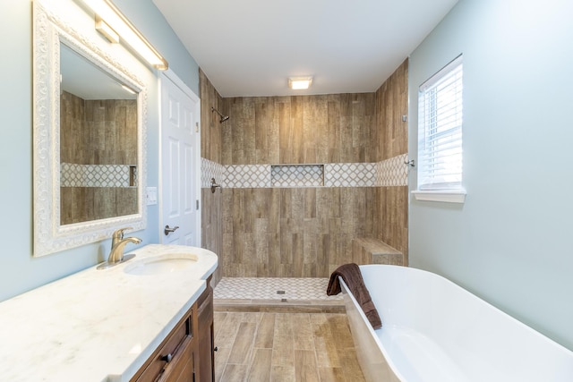 bathroom with vanity and plus walk in shower