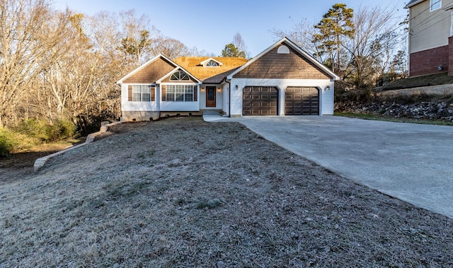 view of front of property with a garage