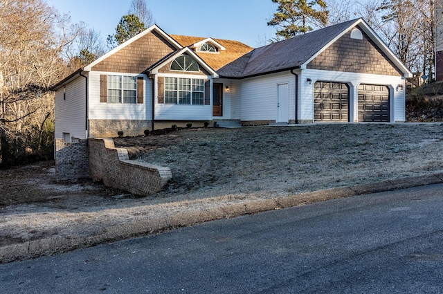 view of front of home with a garage