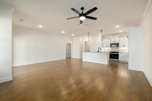 1699 Whisper Winds Ln Unit 34, Ooltewah, TN 37363 - unfurnished living room with ceiling fan, recessed lighting, dark wood-style floors, and ornamental molding