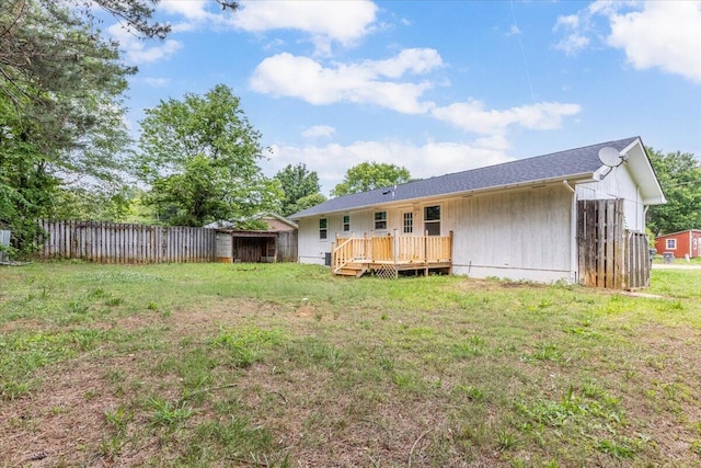 back of property with a deck