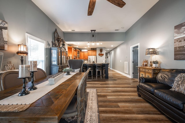 interior space with ceiling fan and dark wood-type flooring