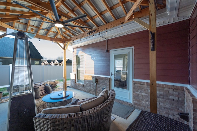 view of patio / terrace featuring a gazebo and ceiling fan